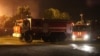Emercom workers tackle a fire at a Gazprom gas distribution station 