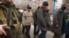 Передача тел погибших украинских военных в аэропорту Донецка 22 января 2015 года